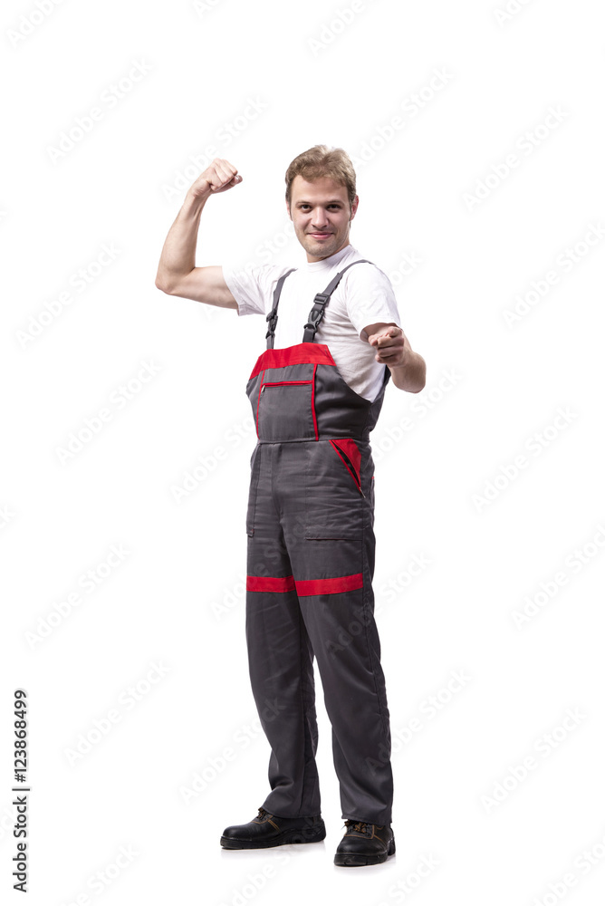 Young construction worker wearing coveralls isolated on white Young construction worker wearing coveralls isolated on white
