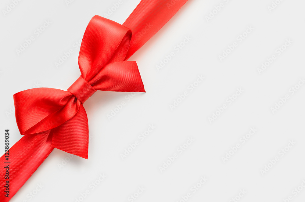 red satin bow on white background, whole object is cut with clipping path red satin bow on white background, whole object is cut with clipping path