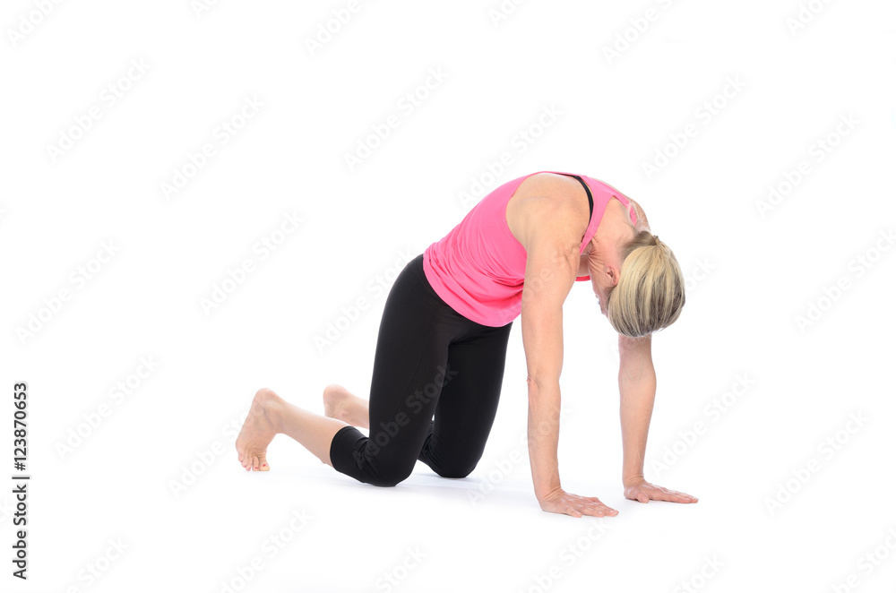Lady in tights practicing yoga poses