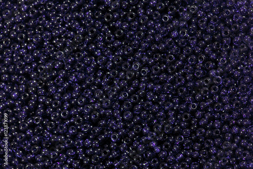 Dark blue beads. Macro photo.