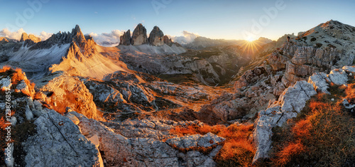 Dolomites mountain panorama in Italy at sunset - Tre Cime di Lav photo