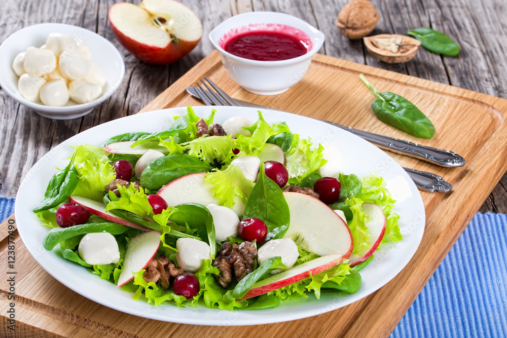 salad of apple, spinach, mozzarella, lettuce leaves, caramelize salad of apple, spinach, mozzarella, lettuce leaves, caramelize