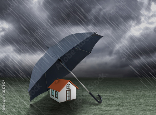 umbrella covering home under heavy rain, insurance concept