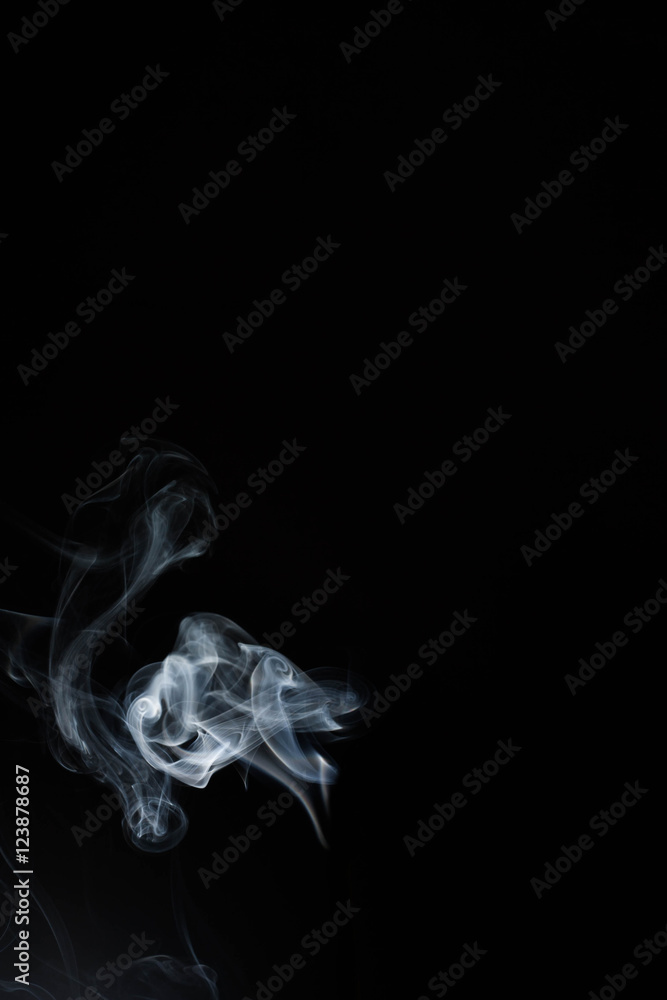Fototapeta premium White or gray smoke isolated on dark background.