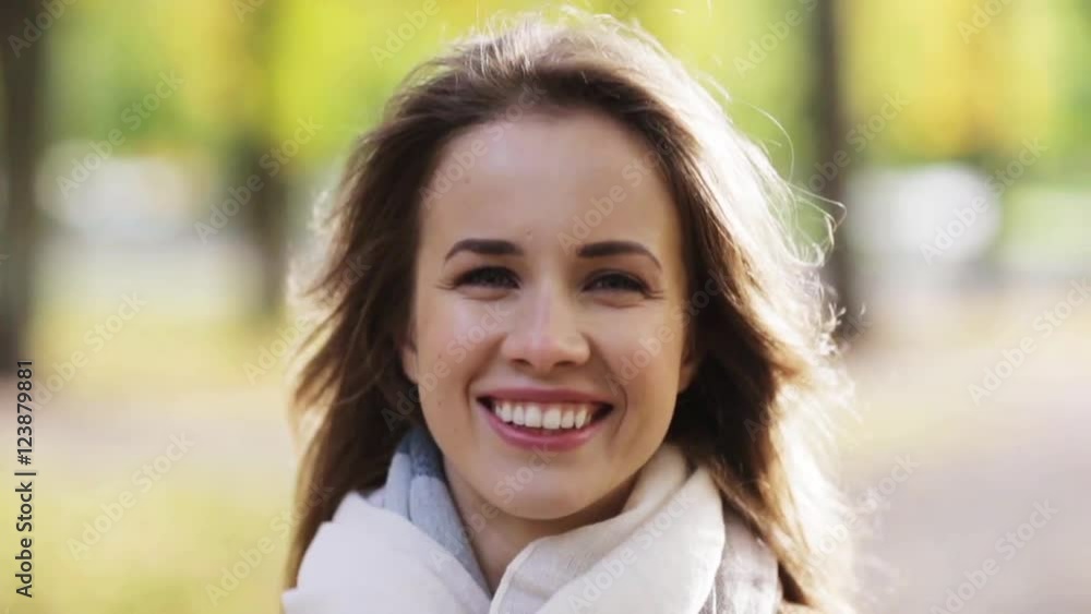 beautiful happy young woman smiling in autumn park beautiful happy young woman smiling in autumn park