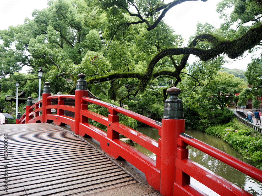 Red bridge at Dazaifu shrine in Fukuoka, Japan Red bridge at Dazaifu shrine in Fukuoka, Japan