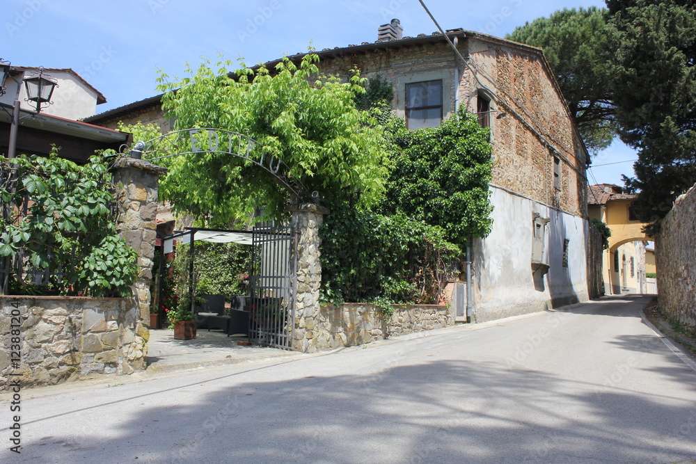 External view of the entrance of an  historical traditional restaurant on Tuscan Hills