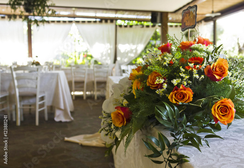 Wedding set up in a restaurant, rose bouquet