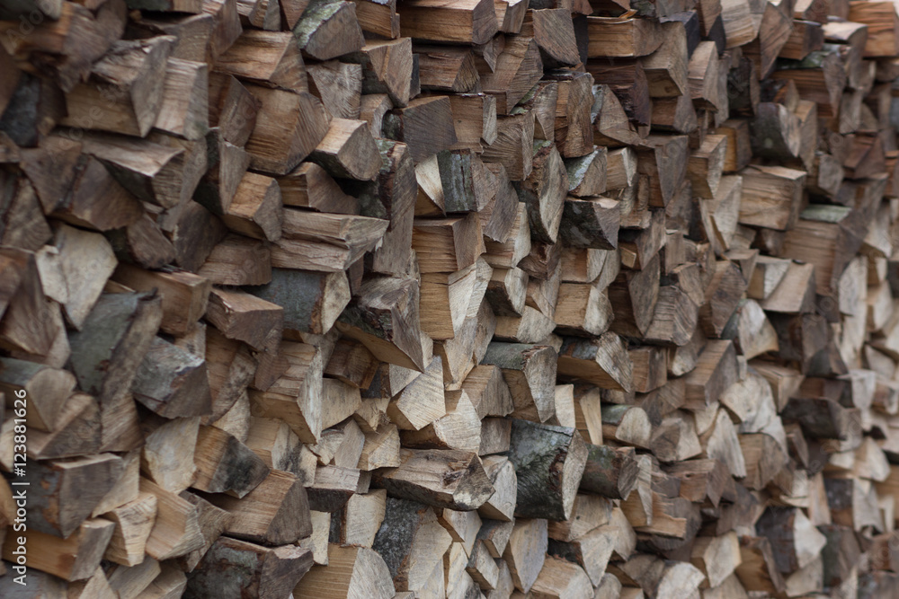 pile of firewood fuel wood woodpile fills the whole frame framed with angle pile of firewood fuel wood woodpile fills the whole frame framed with angle