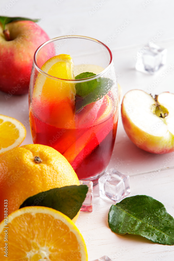 fresh fruit punch with orange and apple slice for refreshment fresh fruit punch with orange and apple slice for refreshment