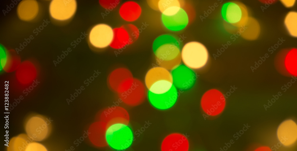 Colourful Christmas background of out of focus twinkle lights