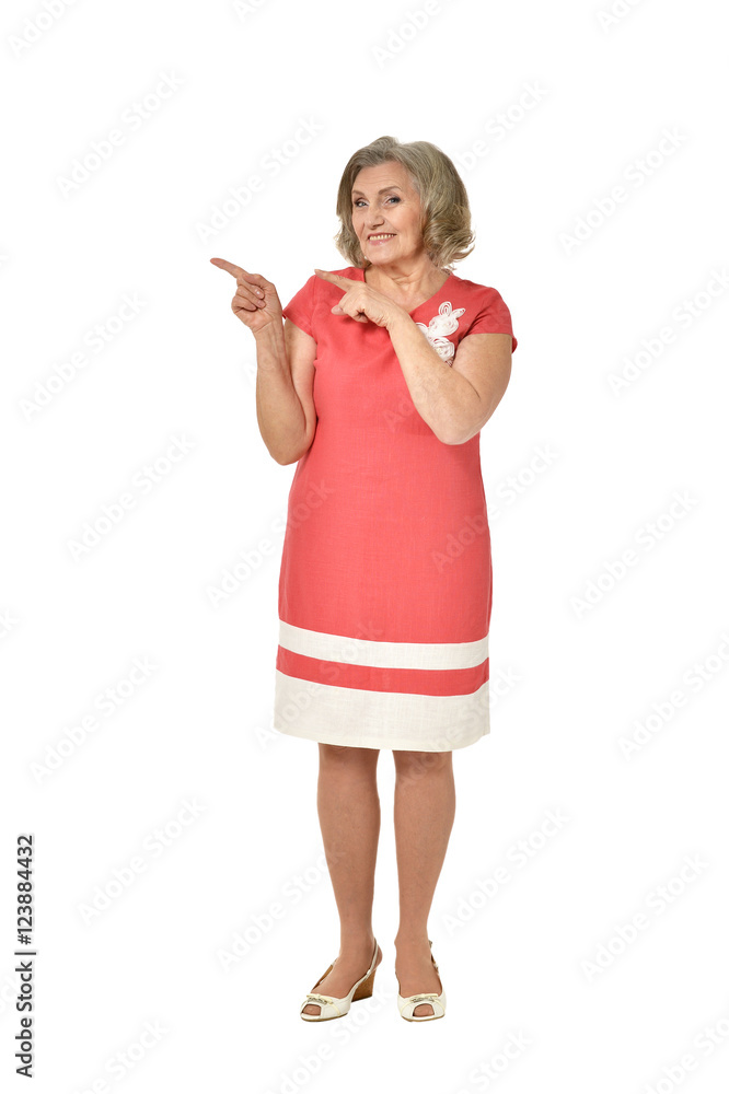Elderly woman in dress pointing Elderly woman in dress pointing