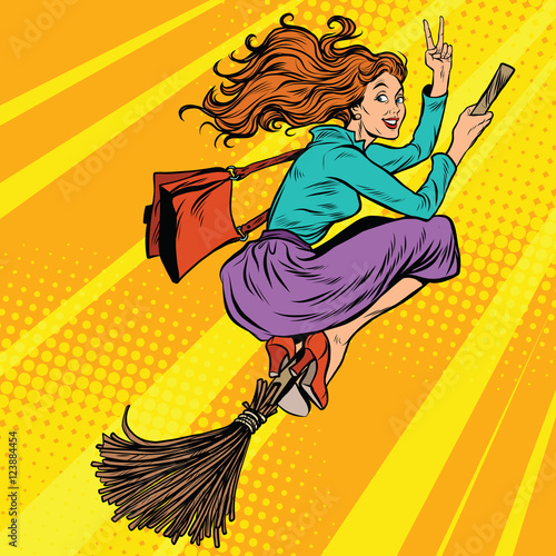 Beautiful woman witch flying on a broom