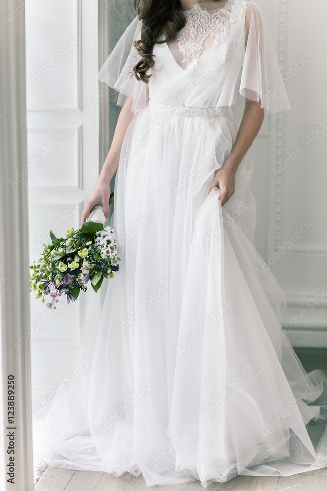 Bride. Young women with wedding dress in very bright room, some Bride. Young women with wedding dress in very bright room, some