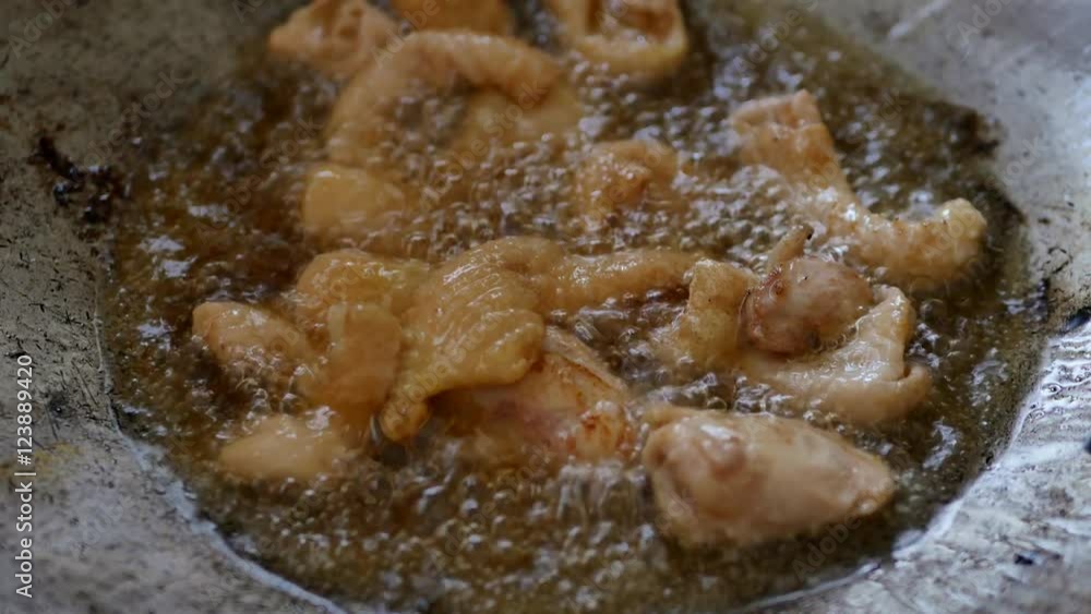 deep fried chicken in hot oil wok deep fried chicken in hot oil wok