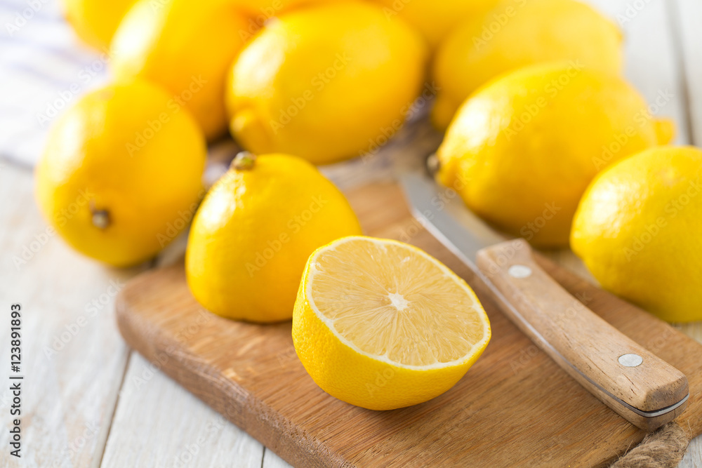 lemons on wooden surface lemons on wooden surface