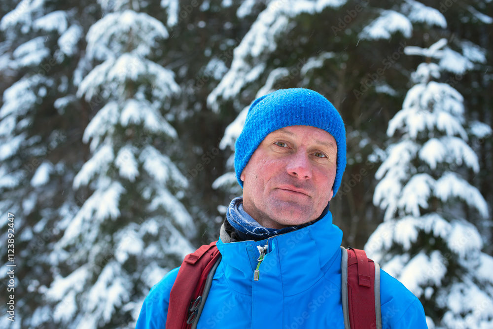 Portrait of smiling hiker in cloudy winter day Portrait of smiling hiker in cloudy winter day