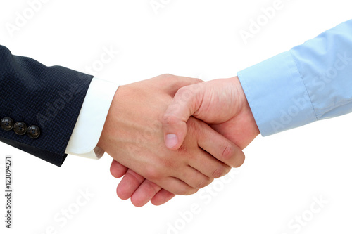 Successful business people shaking hands on a white background