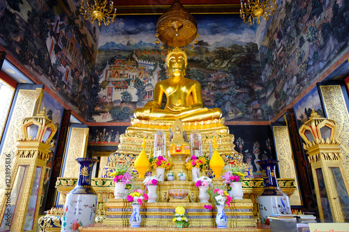 Beautiful of golden Buddha statue and thai art architecture in Wat Bovoranives, Bangkok, Thailand. © iphotothailand