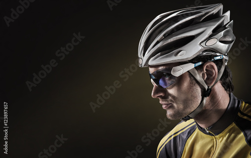 Cyclist. Dramatic close-up portrait photo