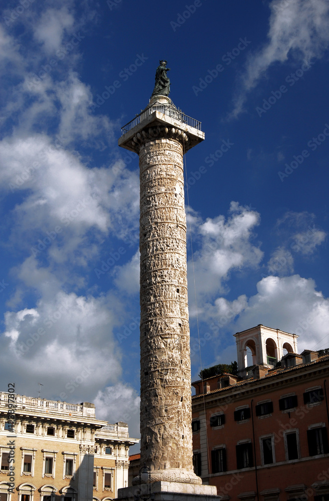 Column of Marcus Aurelius with beautiful sky, in the historic center of Rome