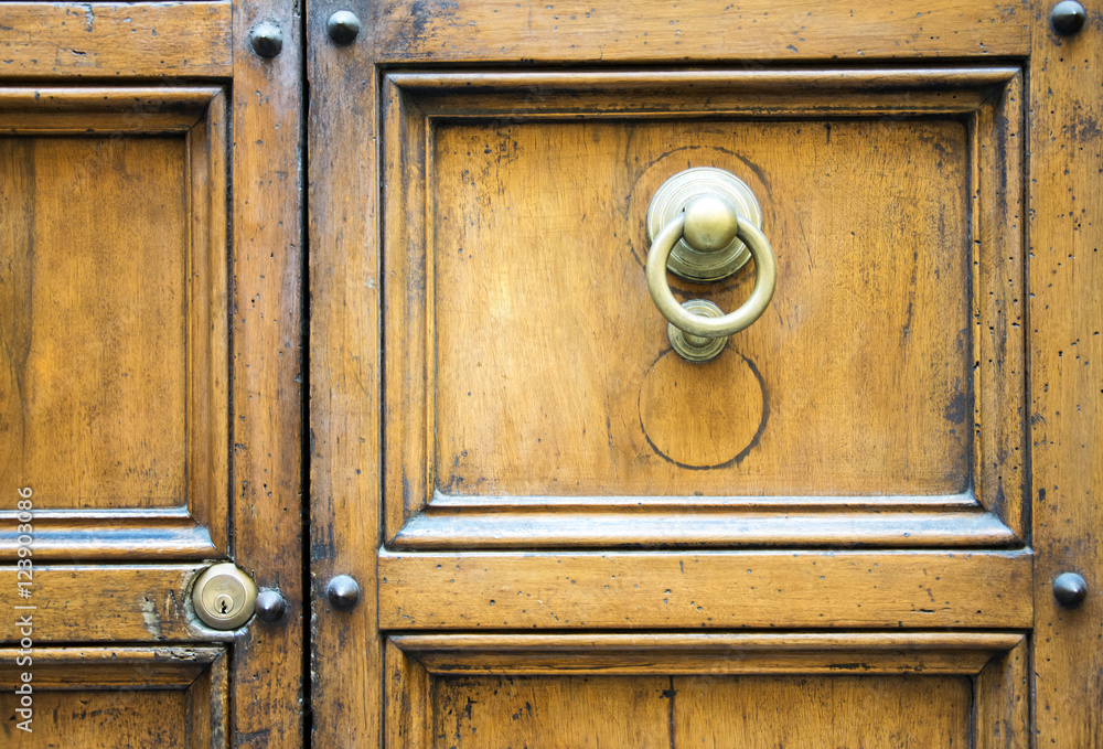 Ancient Italian door in Tuscany, Italy.