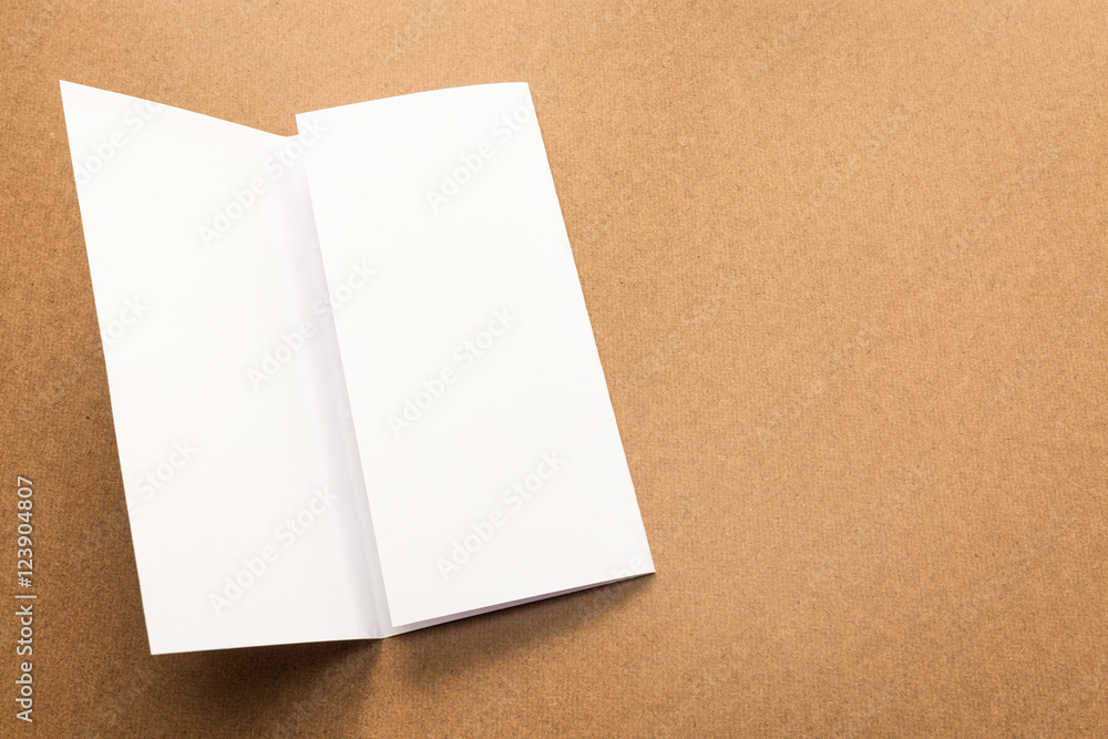 White paper note on business wood desk with copy space. White paper note on business wood desk with copy space.