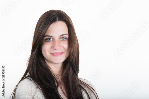 Beauty Woman with long healthy and shiny smooth brown Hair.