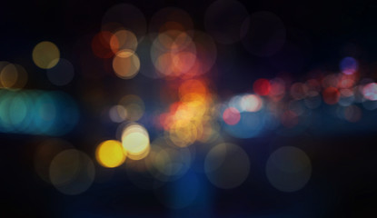 Colorful defocused bokeh lights in blur night background