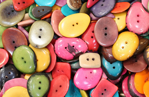 colorful buttons made with dried palm seeds in the ethnic shop photo