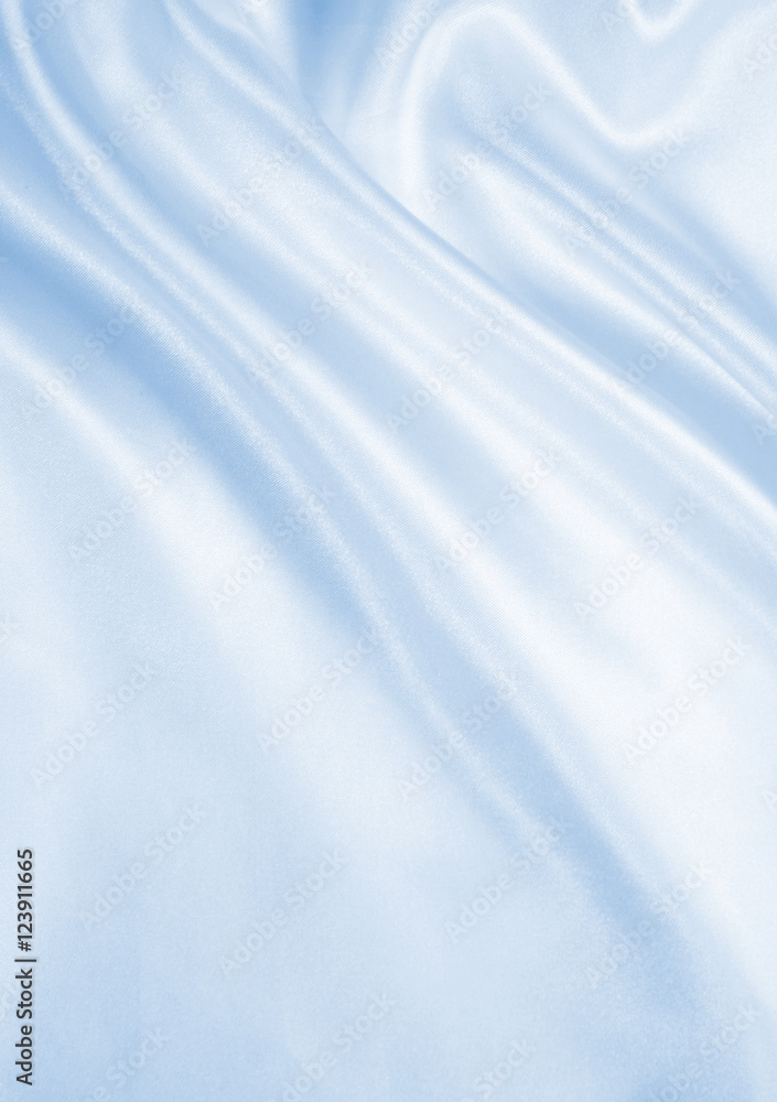 Smooth elegant blue silk or satin texture as background Smooth elegant blue silk or satin texture as background