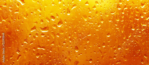 Rainy wet red orange fall eco seasonal  natural background with water drops