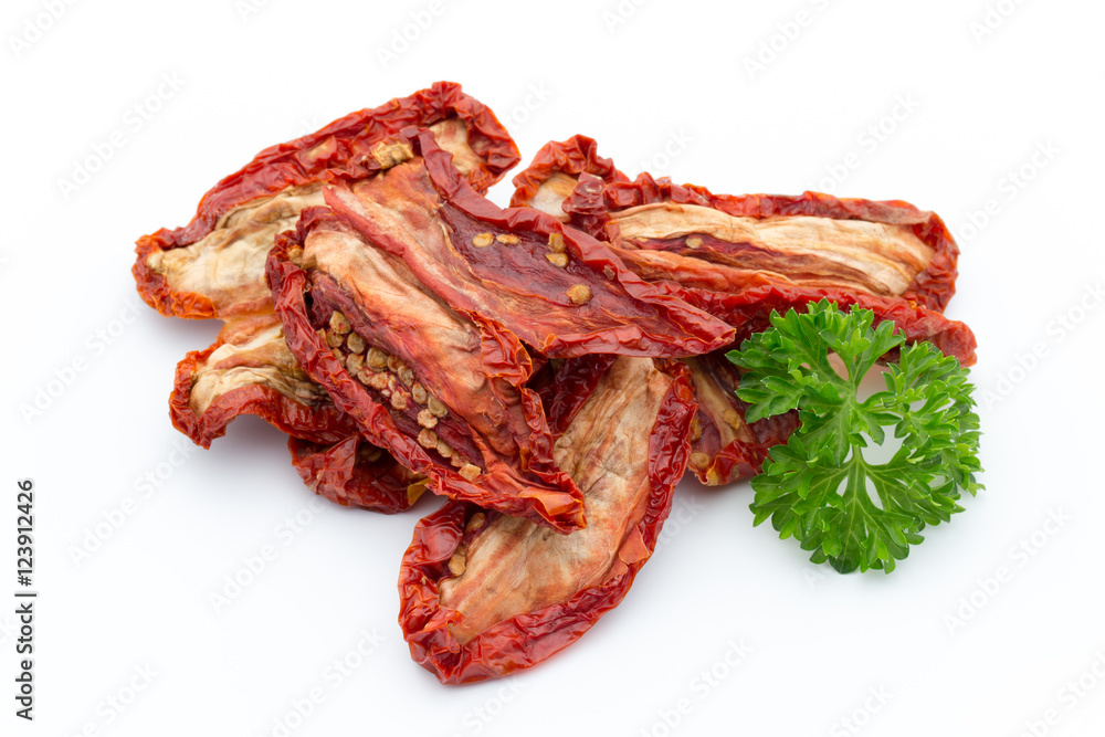 Dried tomatoes isolated on white background.