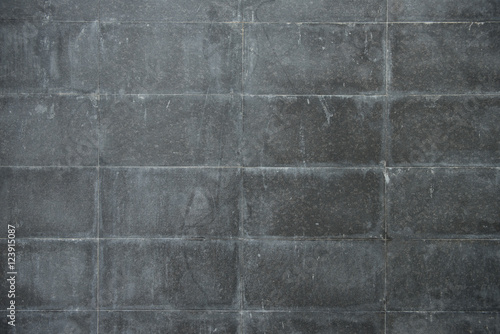 Closeup of grey block wall. grey rectangles slate texture background.