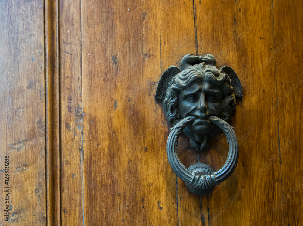 An Antique Door Knocker, Siena, Tuscany, Italy. An Antique Door Knocker, Siena, Tuscany, Italy.