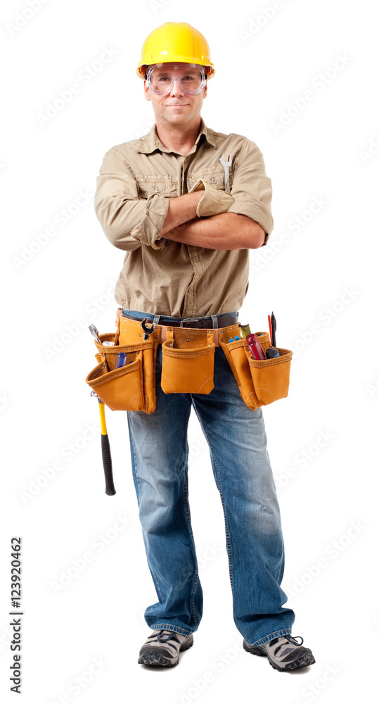 Full-length construction worker contractor carpenter with tool belt hard hat and safety glasses isolated on white background Full-length construction worker contractor carpenter with tool belt hard hat and safety glasses isolated on white background