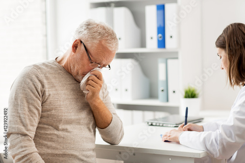 senior man and doctor meeting at hospital