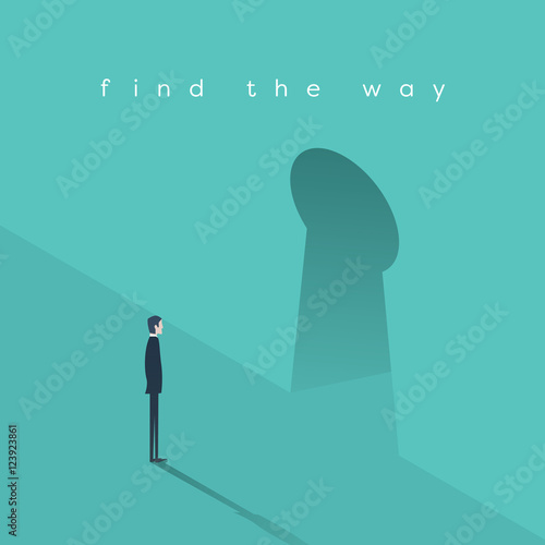 Businessman standing in front of keyhole as a symbol  finding business solution to  problem.