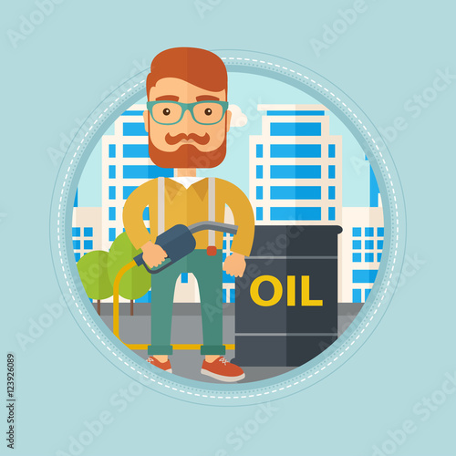 Man with oil barrel and gas pump nozzle.