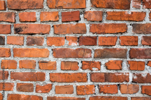 Brick wall sealed with concrete