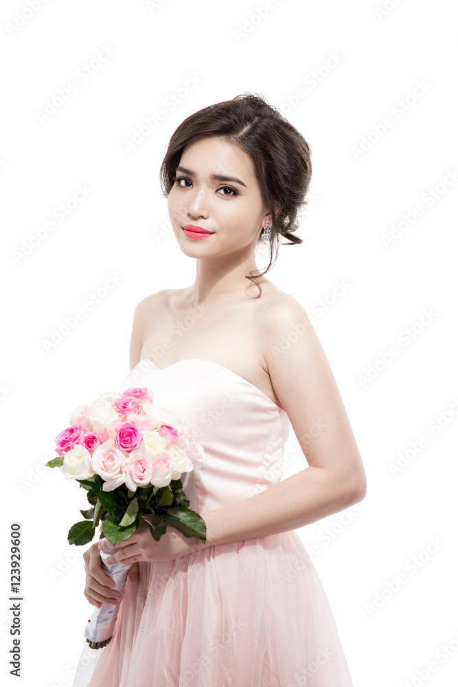 Happy bride with a bouquet of roses. Isolated on white backgroun