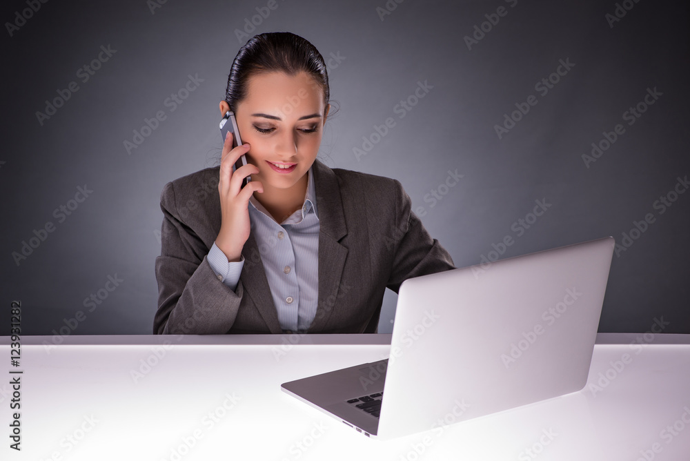 Businesswoman with laptop in business concept Businesswoman with laptop in business concept