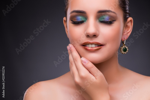 Beautiful woman with jewellery in beauty concept