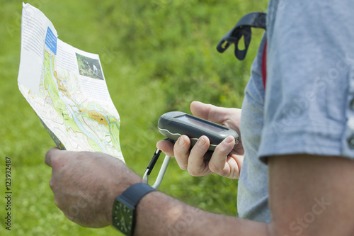Man with gps and plan
