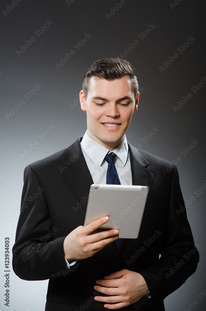 Businessman using his tablet computer in business concept Businessman using his tablet computer in business concept