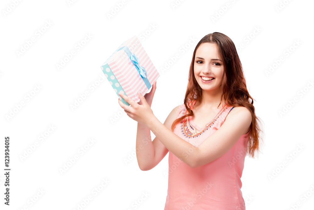 Young woman with giftbox isolated on white Young woman with giftbox isolated on white