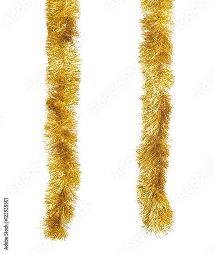 Two golden garlands hanging against white background. Christmas decoration. 