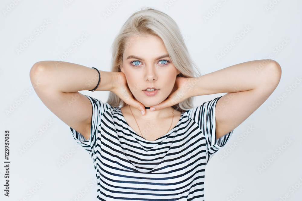 Fototapeta premium female model with blond hair posing in studio