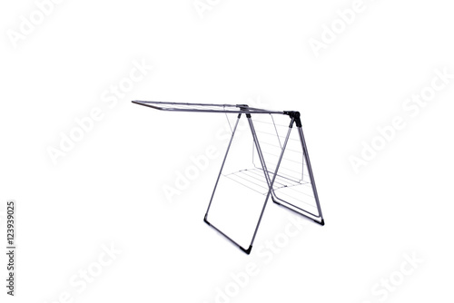 Collapsible clotheshorse isolated on the white background © Elnur