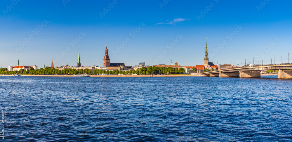 Panoramic view on the embankment of the Daugava River and bridge Panoramic view on the embankment of the Daugava River and bridge